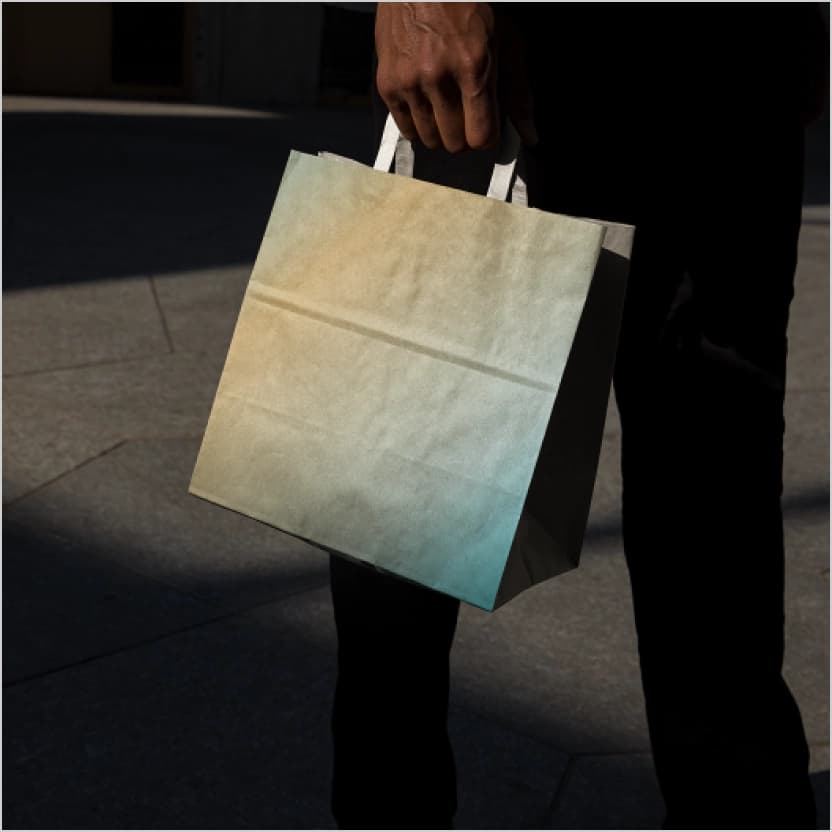 guy holding bag